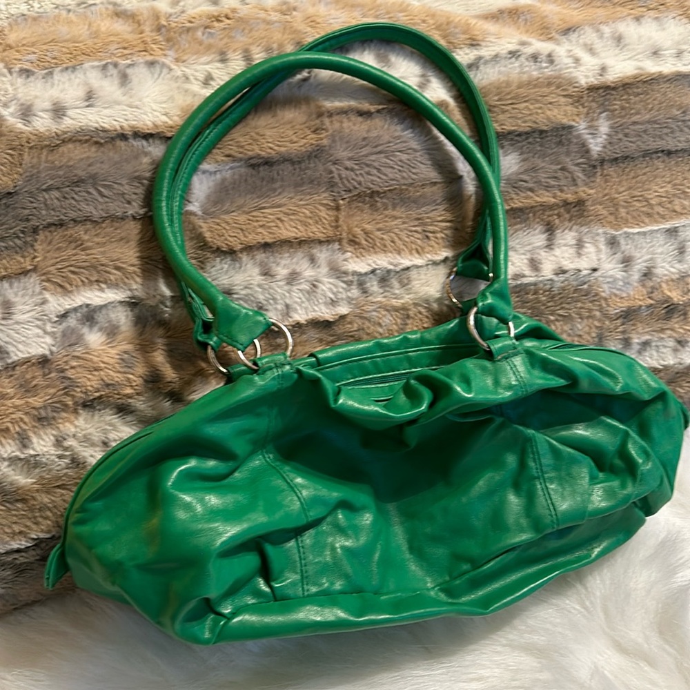 Green purse. No brand tag.